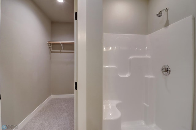 bathroom featuring a shower