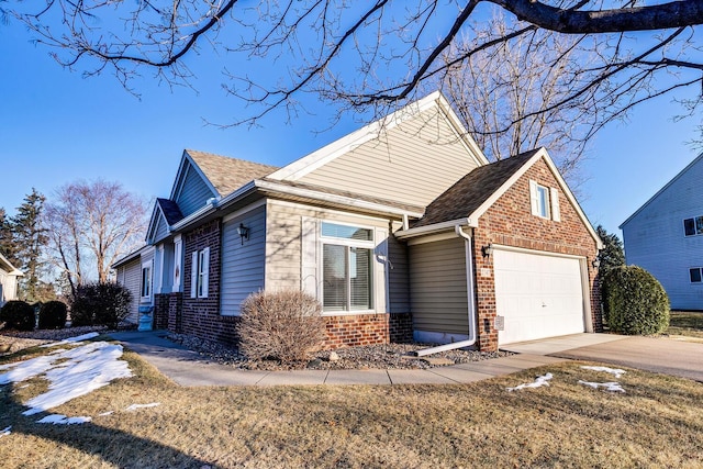 view of side of home featuring a garage