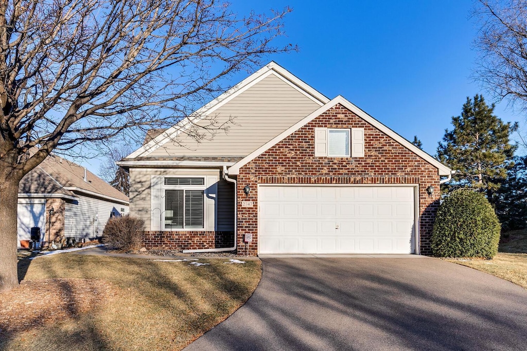 front facade with a garage