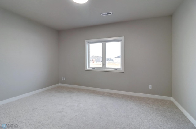 unfurnished room with carpet