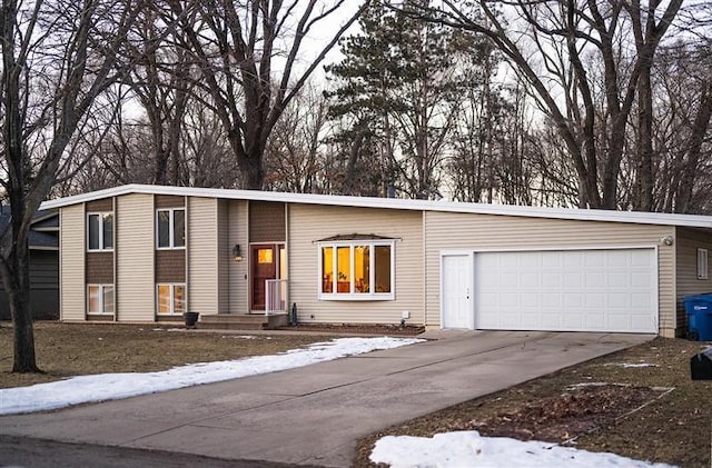 view of front of home with a garage