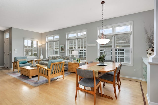 dining space featuring light hardwood / wood-style flooring