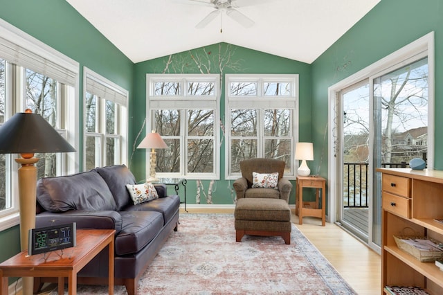 sunroom with vaulted ceiling and ceiling fan