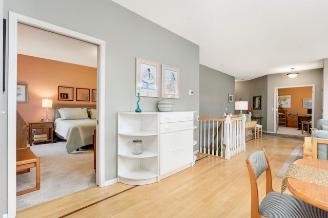 bedroom with hardwood / wood-style flooring