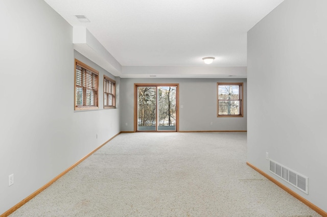 view of carpeted spare room