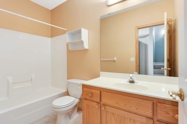 full bathroom featuring tile patterned flooring, vanity, shower / washtub combination, and toilet