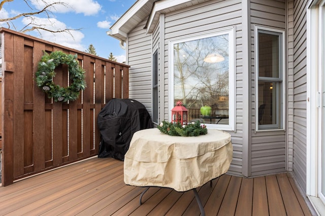 wooden deck featuring grilling area