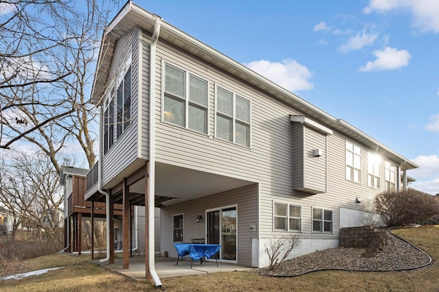 rear view of house with a patio