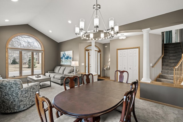 carpeted dining room with a chandelier, recessed lighting, stairs, and vaulted ceiling