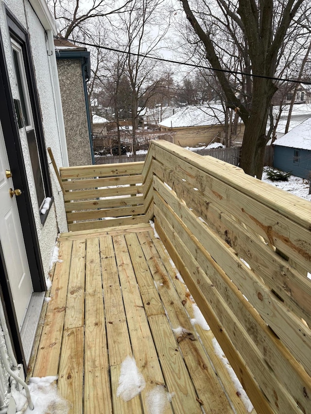 view of snow covered deck