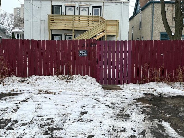 view of snow covered gate