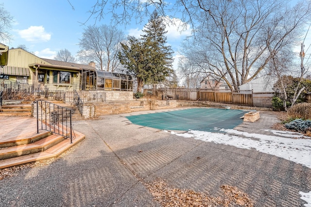 view of pool with a patio and a deck