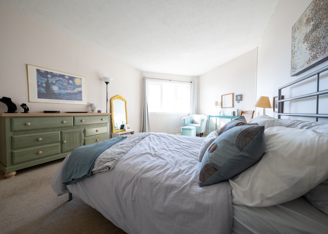 carpeted bedroom with a textured ceiling