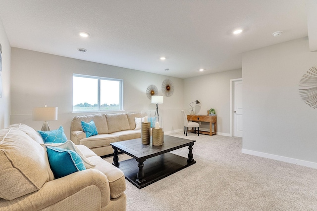 living room with light carpet, baseboards, and recessed lighting