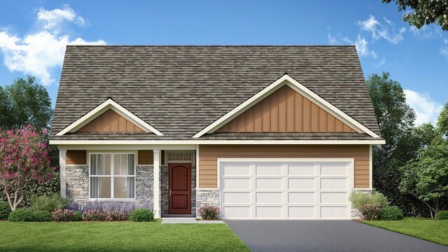 craftsman house with a front lawn, aphalt driveway, stone siding, board and batten siding, and an attached garage