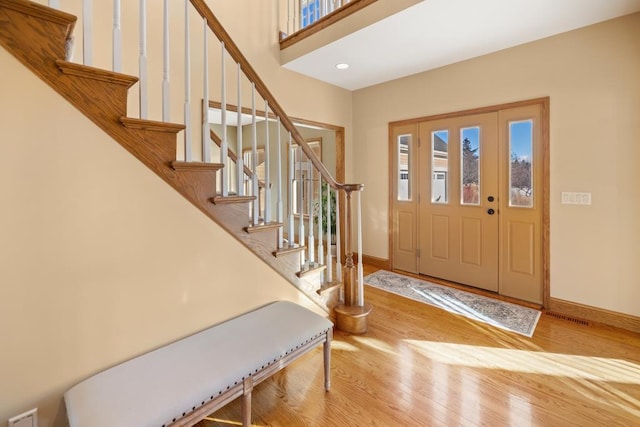 entrance foyer with light wood-type flooring