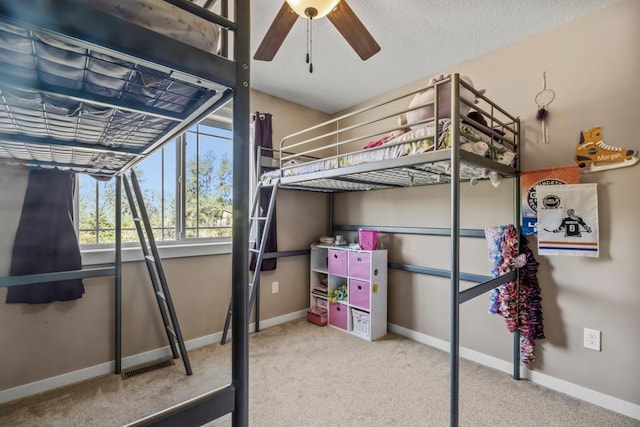 bedroom featuring baseboards and carpet floors