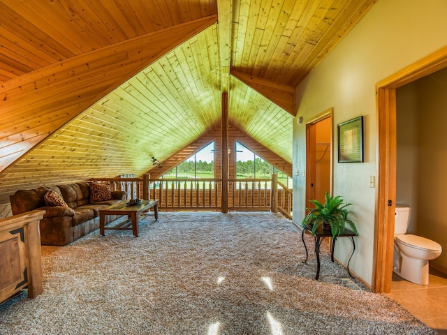 additional living space featuring lofted ceiling and wooden ceiling