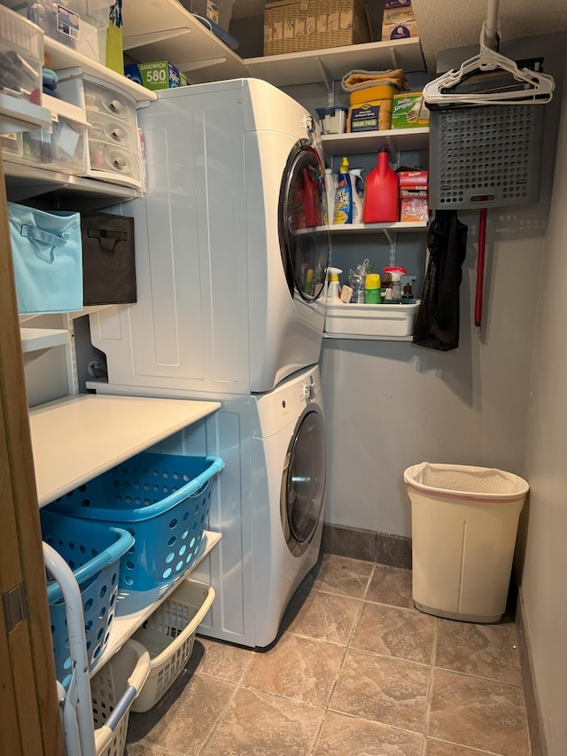 laundry room with stacked washer and clothes dryer