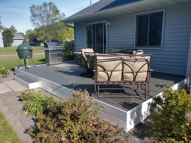 wooden terrace featuring area for grilling