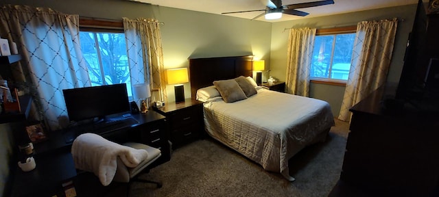 carpeted bedroom featuring ceiling fan