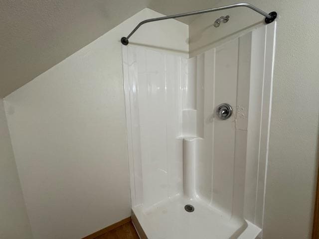 bathroom featuring a stall shower