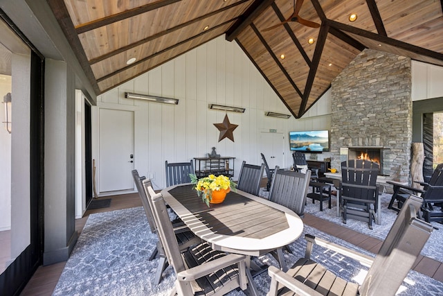 3175 Tuckborough Trl, Medina, MN 55356 - view of patio / terrace with outdoor dining area and an outdoor stone fireplace