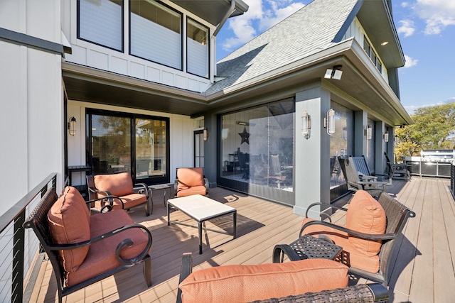 3175 Tuckborough Trl, Medina, MN 55356 - wooden deck with an outdoor living space
