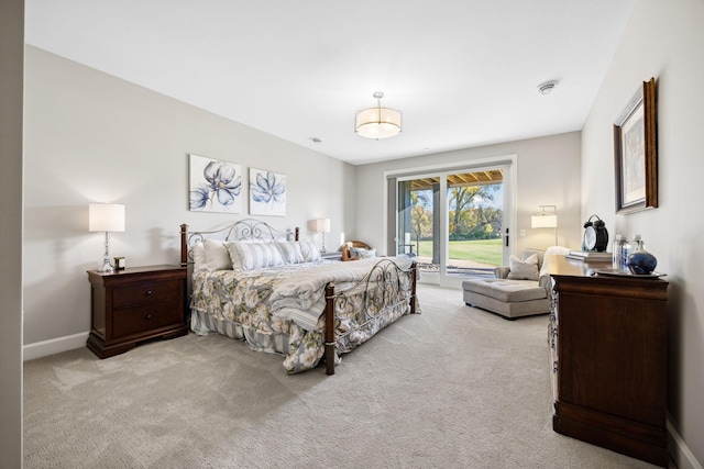 3175 Tuckborough Trl, Medina, MN 55356 - carpeted bedroom with access to exterior and baseboards