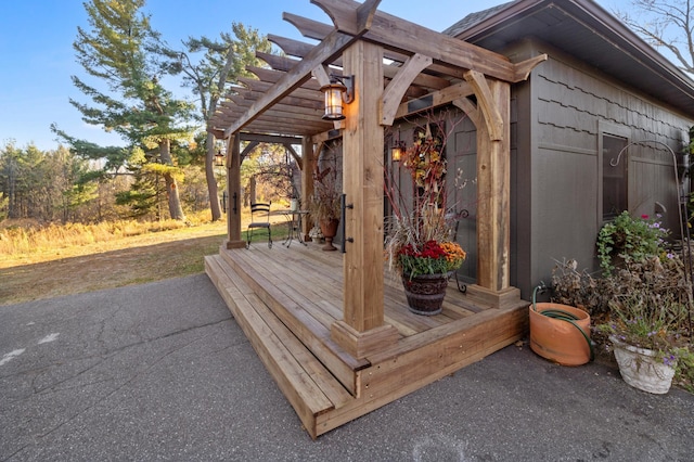 wooden deck with a pergola