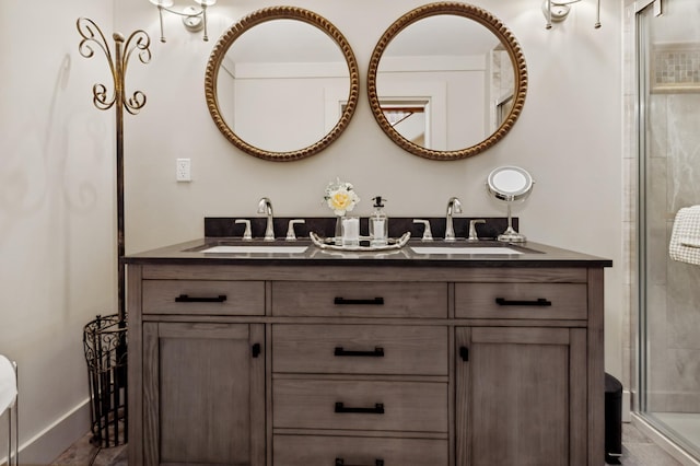 bathroom featuring vanity and an enclosed shower