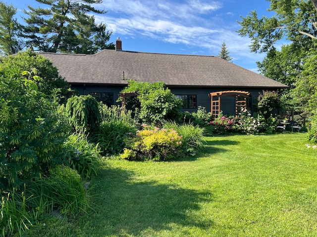 exterior space featuring a lawn