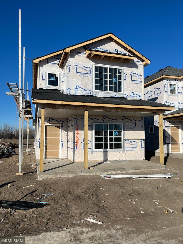 property in mid-construction with a porch