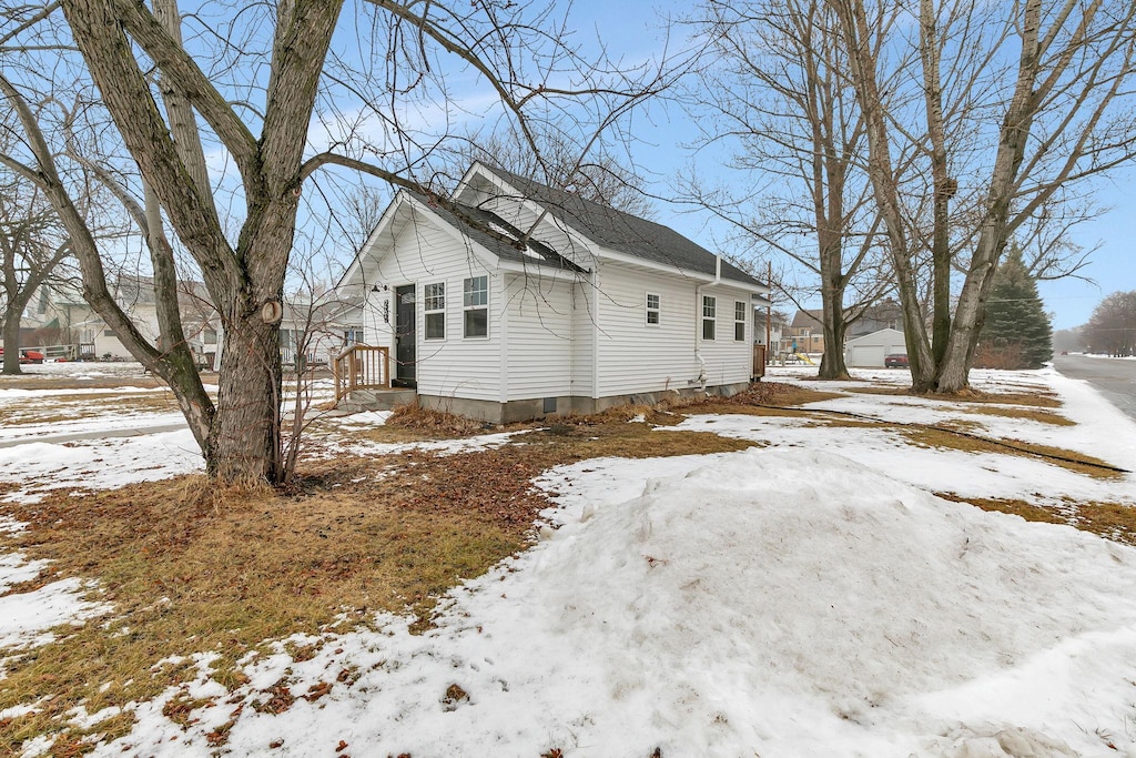 view of snow covered property