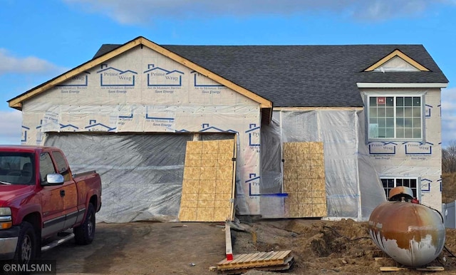 property in mid-construction featuring a garage