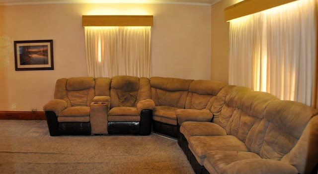 410 5th St, Montevideo, MN 56265 - carpeted living room featuring ornamental molding and baseboards
