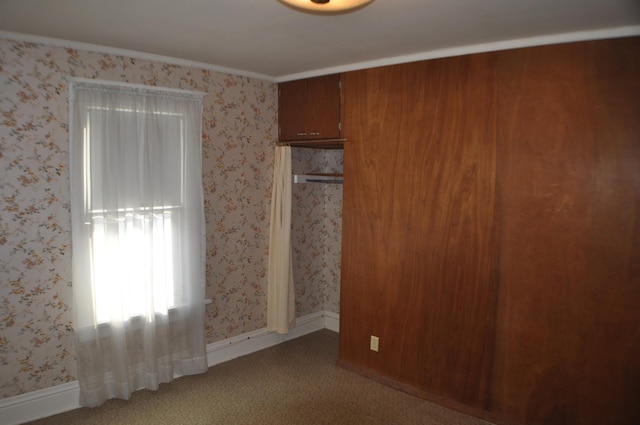 410 5th St, Montevideo, MN 56265 - unfurnished bedroom featuring light carpet and wallpapered walls