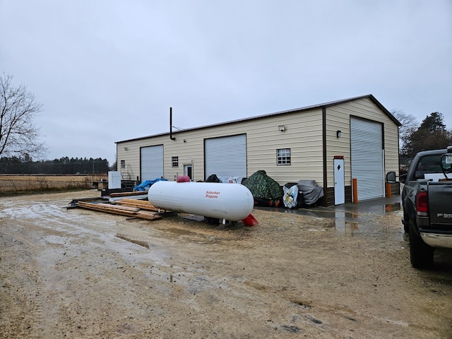 view of outbuilding with a garage