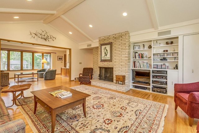 1755 Glenview Ave, Arden Hills, MN 55112 - living room featuring light wood finished floors, a brick fireplace, and recessed lighting