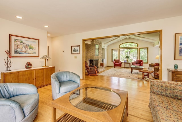 1755 Glenview Ave, Arden Hills, MN 55112 - living area with lofted ceiling, light wood-type flooring, a fireplace, and recessed lighting