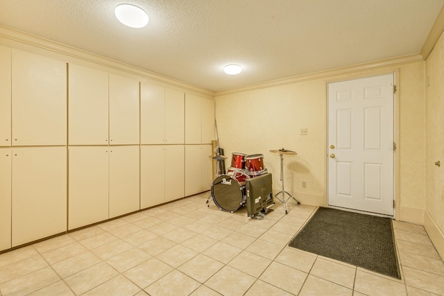 1755 Glenview Ave, Arden Hills, MN 55112 - misc room with ornamental molding, a textured ceiling, and light tile patterned floors