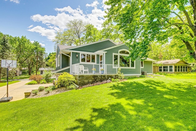 1755 Glenview Ave, Arden Hills, MN 55112 - view of front facade featuring a porch, a front lawn, central AC unit, and driveway
