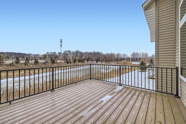 deck featuring a water view