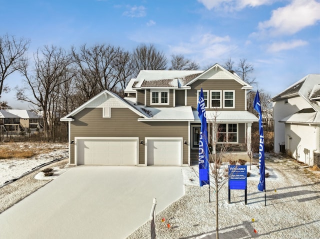 view of front of home with a garage