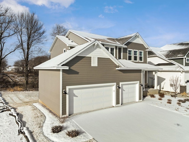 view of front of home with a garage