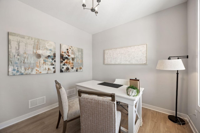 dining room featuring hardwood / wood-style flooring