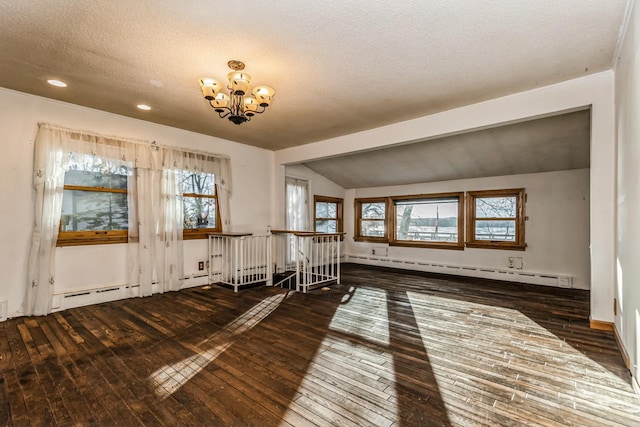 interior space with a textured ceiling, dark wood-type flooring, a baseboard radiator, a notable chandelier, and vaulted ceiling with beams