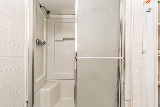 bathroom featuring walk in shower