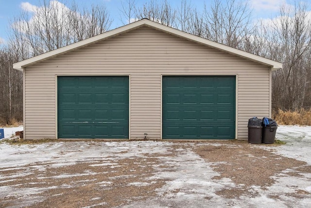 view of snow covered garage