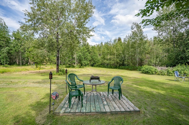 view of yard featuring a wooden deck